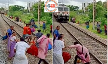 Social media Viral video : ट्रेन के सामने पटरी पार कर रहे थे यात्री, ऐसा क्या हुआ जो देख कर सब के रोंगटे हो गये खड़े ...देखे विडियो...