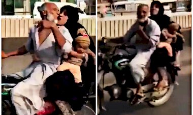 बाइक चलाते महिला को किया Kiss VIDEO: बाइक से जा रहा था बुजुर्ग शख्स, पीछे बैठी महिला को कर लिया किस, फिर जो हुआ, देखें वीडियो.....
