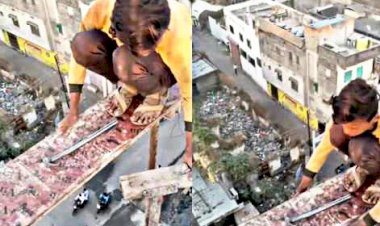 Shocking VIDEO: सैकड़ों फीट ऊपर बिना सुरक्षा के काम कर रहा मजदूर... Video देख खौल उठा लोगों का खून....
