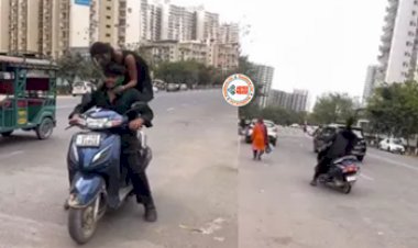 Holi Stunt Viral Video : चलती स्कूटी पर खड़े होकर रंग लगाने लगी लड़की, लेकिन तभी हुआ कुछ ऐसा, निकल गई सारी हवाबाजी, देखें मजेदार विडियो...