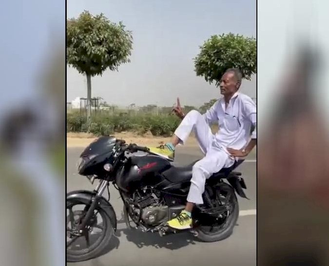Bike Stunt video :52 की उम्र में चाचा का तूफानी स्टंटबाजी वाला VIDEO वायरल...दोनों हाथ छोड़कर सड़क पर दौड़ाई बाइक...फिर स्टैंड पर खड़ा भी हुआ…फिर जो हुआ…देखे विडियो….